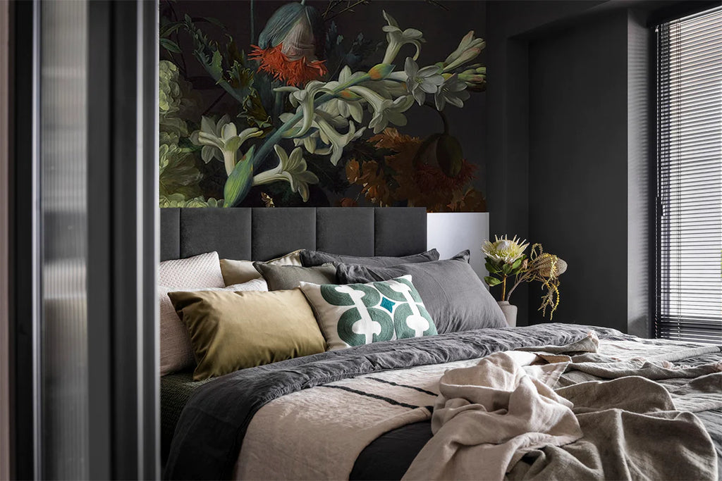 Night Blooms, Floral Mural Wallpaper adorning the wall of a cozy bedroom