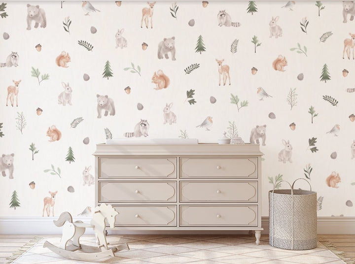 patterned wallpaper features adorable woodland creatures, pine trees and acorns. 