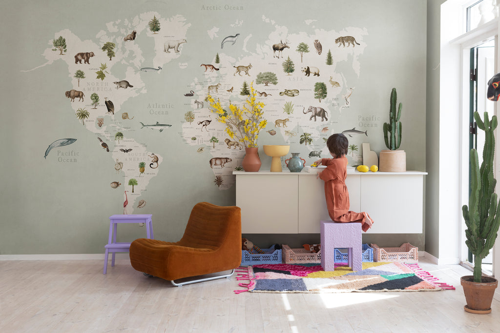 Animal World, World Map Mural Wallpaper in green featured in a kid’s room with toys and furnitures for children
