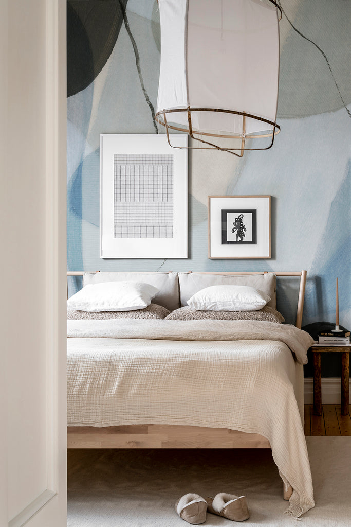 Closed up Asana, Abstract Mural Wallpaper in Blue featured on the wall of a cozy bedroom