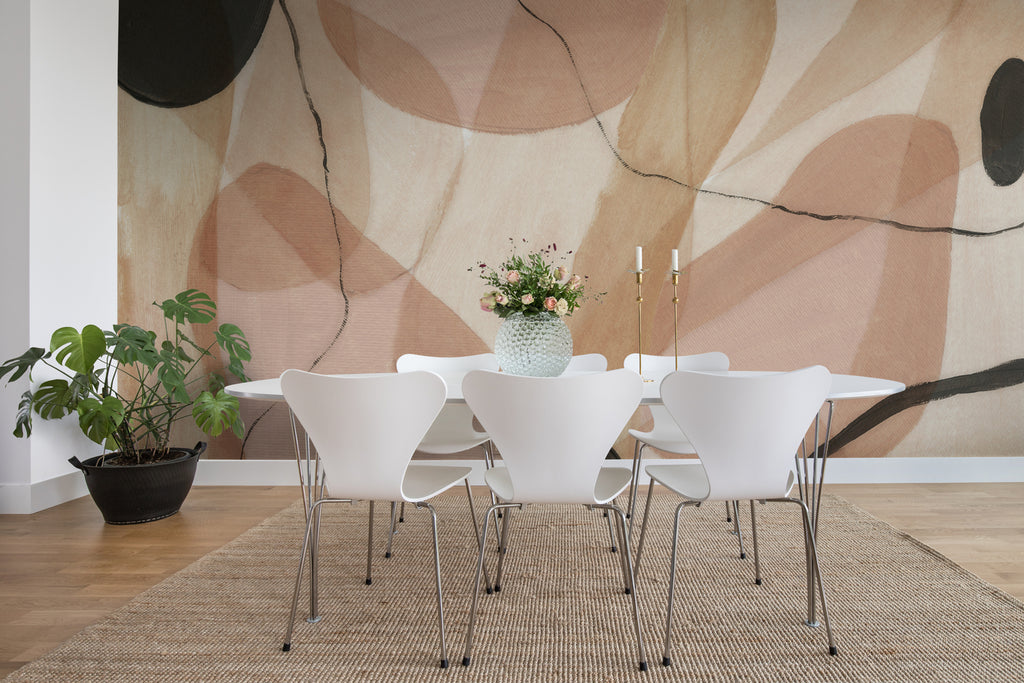 Asana, Abstract Mural Wallpaper in pink featured on the wall of a dining area