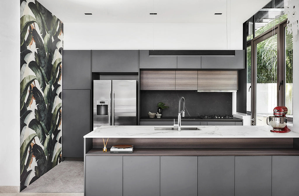 Banana Leaves, Tropical Pattern Wallpaper featured on a wall of a kitchen with modern aesthetics with wood and grey color tone