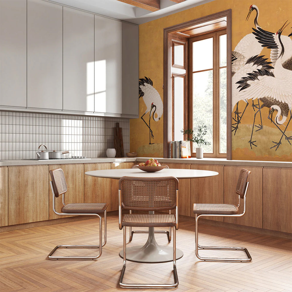 A vibrant room adorned with Crane Birds, Animal Mural Wallpaper in their natural habitat, adding a touch of nature’s tranquility. Imagine a spacious, well-lit area with high ceilings. The floor is covered with polished hardwood, reflecting the soft glow of the ambient lighting. Contemporary furniture, including a plush sofa and a sleek coffee table, are strategically placed, creating a cozy yet sophisticated atmosphere. 