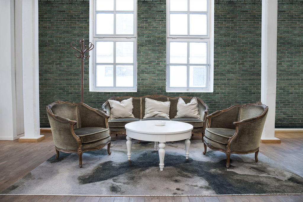 Emerald Tiles, Wallpaper featured on a wall of a living room with wooden flooring and marble patterned floormat, along with vintage sofas and white round table