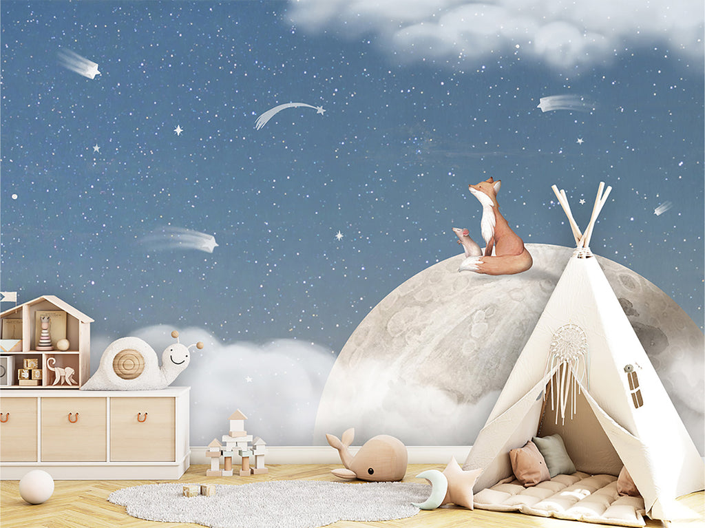 A spacious children’s room, filled with modern wooden furniture and playful elements like a teepee and plush toys. The room’s imaginative atmosphere is enhanced by the Fox on the Moon Mural Wallpaper in Blue.