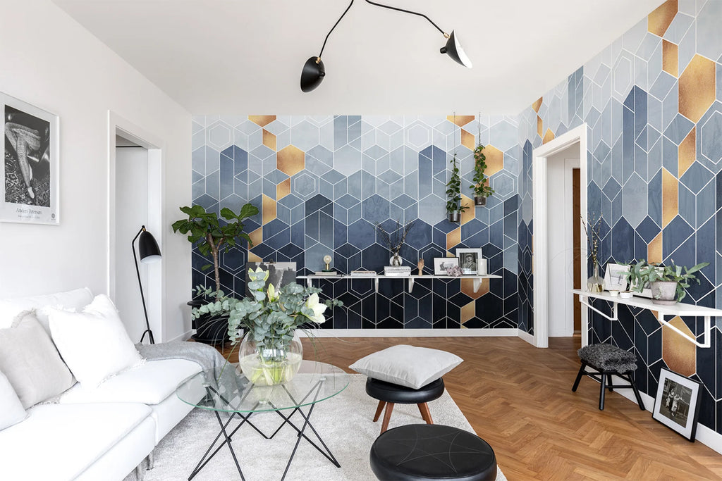 Geometric Blue & Gold, Wallpaper featured on a wall of a living room with white sofas and coffee table and wood flooring