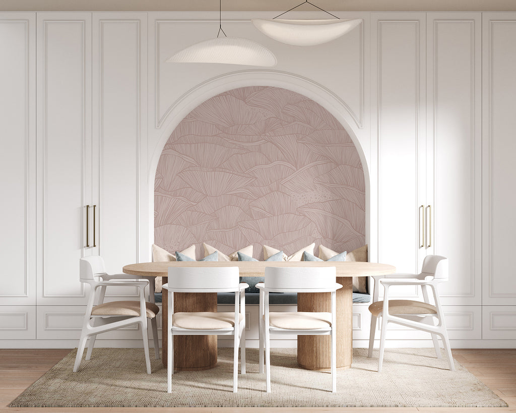 A modern, spacious dining room featuring an arched alcove, a large wooden table with white chairs, a sleek floor lamp, and a unique light fixture. The room’s elegance is enhanced by the Saltwater Ripples, Pattern Wallpaper in Pink.