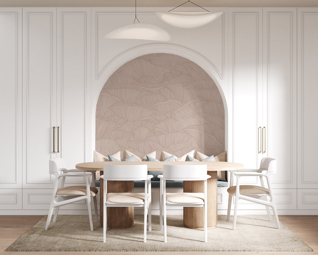 A modern, spacious dining room featuring an arched alcove, a large wooden table with white chairs, a sleek floor lamp, and a unique light fixture. The room’s elegance is enhanced by the Saltwater Ripples, Pattern Wallpaper in Sand.