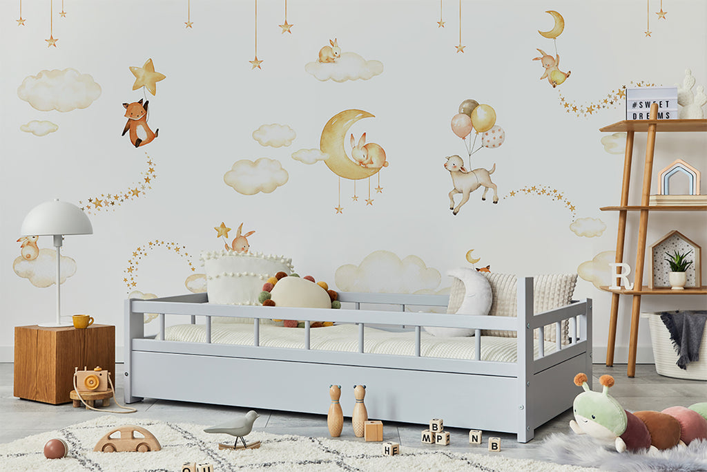 A serene children’s room adorned with Twilight Safari, Animal Mural Wallpaper in White. The room features a white crib, wooden toys, and a soft rug, creating a peaceful and imaginative atmosphere.