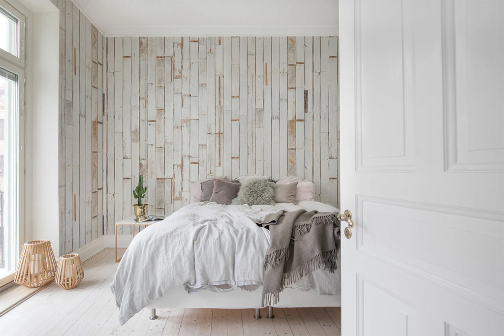 Bali Boards, Striped Wallpaper featured on a wall of a comfortable bedroom with white blankets, sheets and grey throw blanket