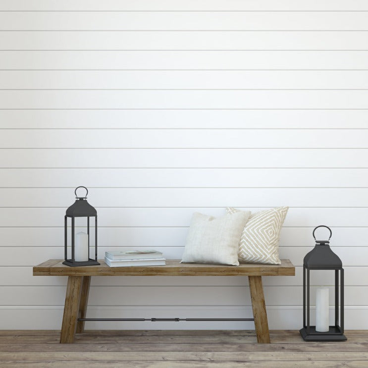 Shiplap, Horizontal Striped Wallpaper featured on a wall with a bench and pillows on it. 