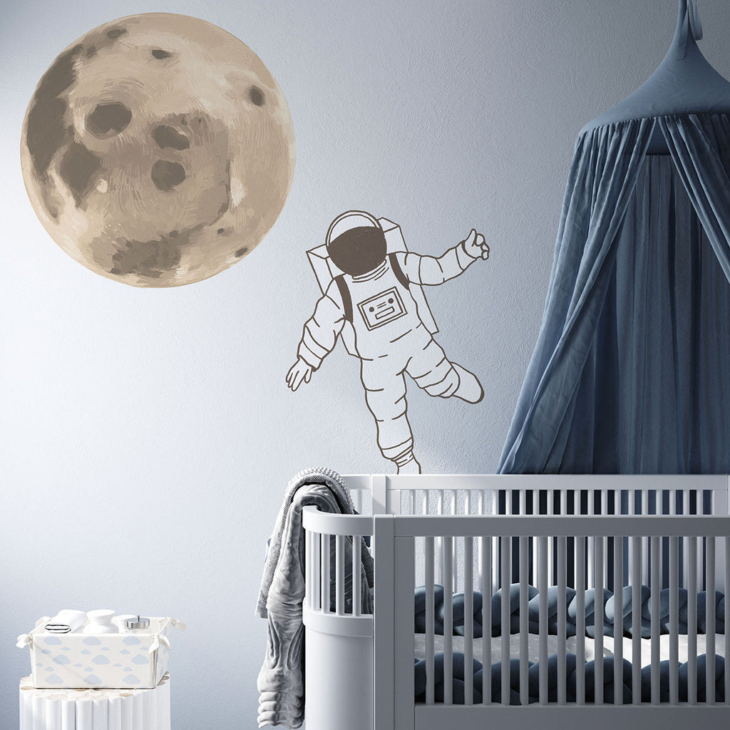 Moon Wall Decal in a nursery with an astronaut wall decal.