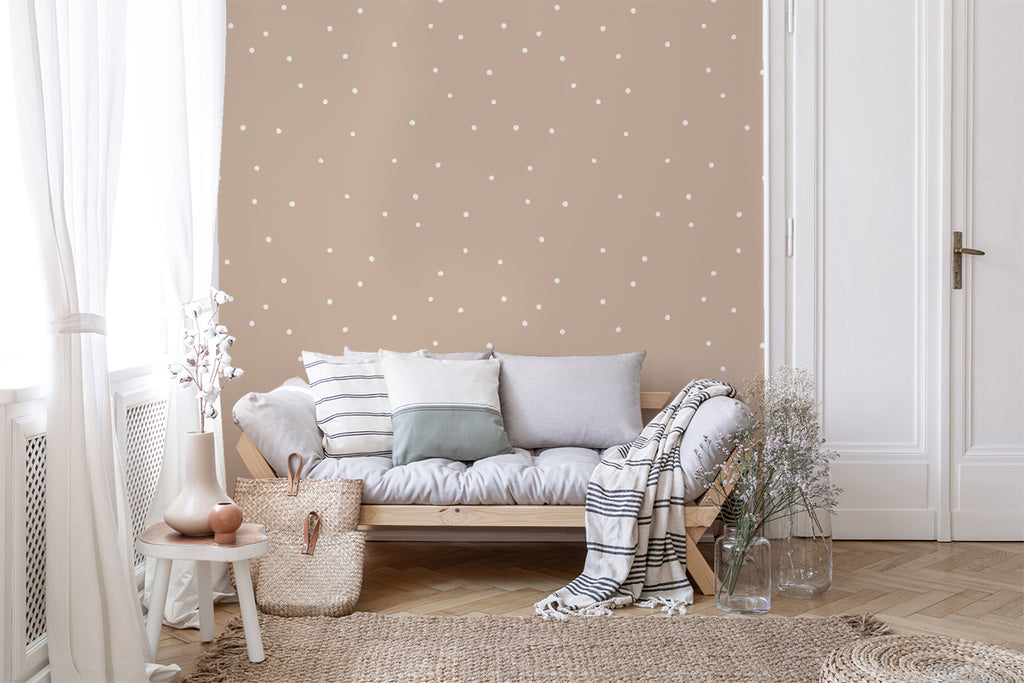 Polka Delicate Dots, Wallpaper in nude graces a wall in a cozy living area.