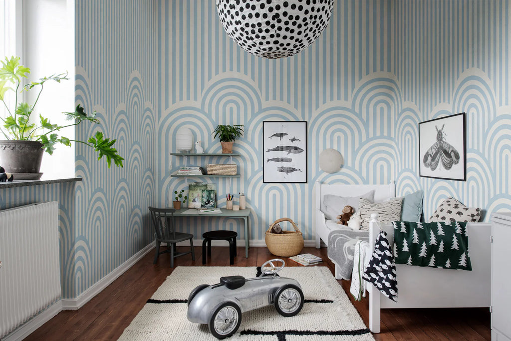 Sail Away wallpaper in a kids' bedroom with a bunk bed. Two young boys are shown playing in their bunk beds.