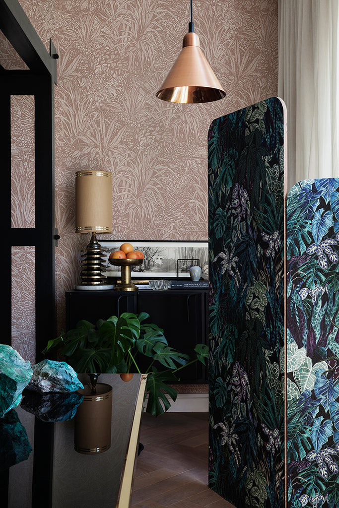 Amazon, Botanical Pattern Wallpaper  in blush pink  featured in a room with glass table, a pendant light, and wooden flooring