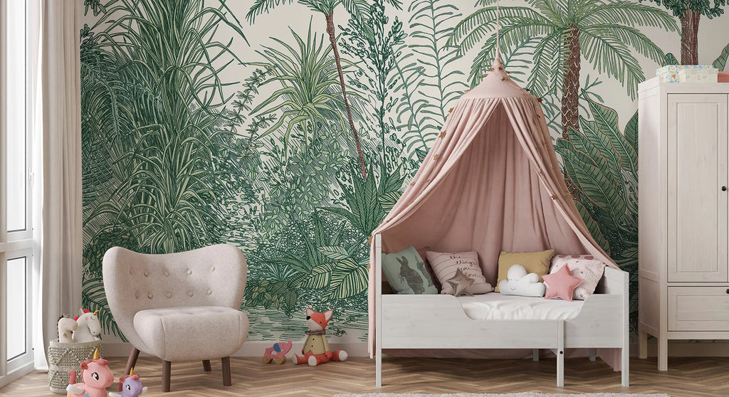 The room, featuring Ara’s Jungle, Tropical Mural Wallpaper in Forest Green, is adorned with a white crib, a chair, plush toys, and a pink tent. The wallpaper adds a tropical touch.