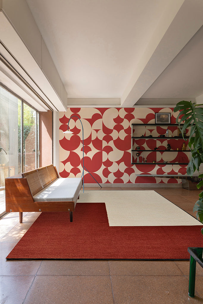 Arcadian Harmony, Geometric Wallpaper in red colourway featured on a wall of a living area