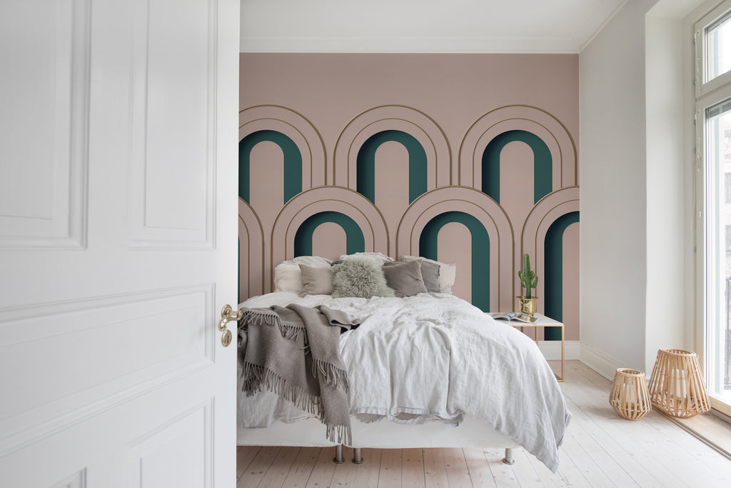 Arch Decor, Geometric Wallpaper featured on a wall of a bedroom with white soft bedsheets and cushion with a variety of pillows which includes, grey and brown, as seen by its entrance  