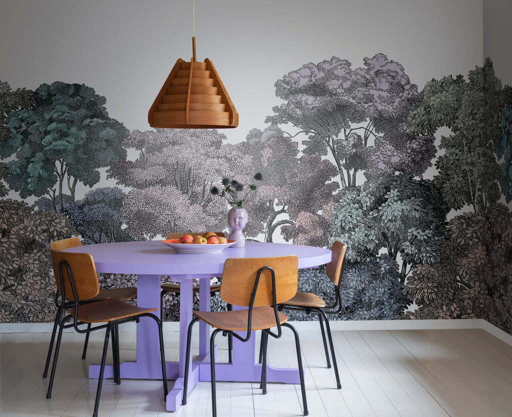Bellewood Rainbow, Tropical Mural Wallpaper featured in a wall of a room with violet round table, and modern chairs, a wooden style pendant light can also be seen 