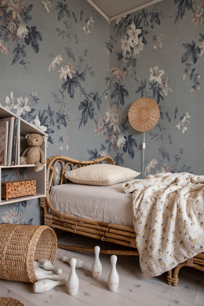 Faded Passion, Floral Wallpaper in blue featured on a wall of a bed room with mostly rattan furnitures and colorscheme 