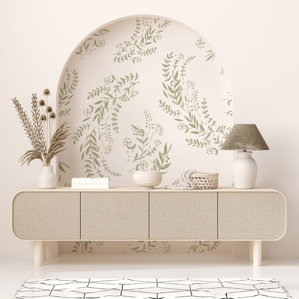 Flower Fields, Floral Patten Wallpaper  in Green adorning a room’s wall, featuring a lush display of green foliage designs on an off-white backdrop, enhancing the serene and minimalist interior.