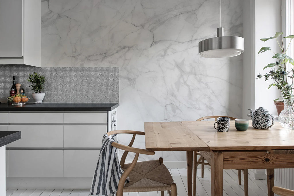 Marble Art, Texture Wallpaper featured on a wall of a kitchen and dining area with wooden dining table and chair with granite grey countertop finish