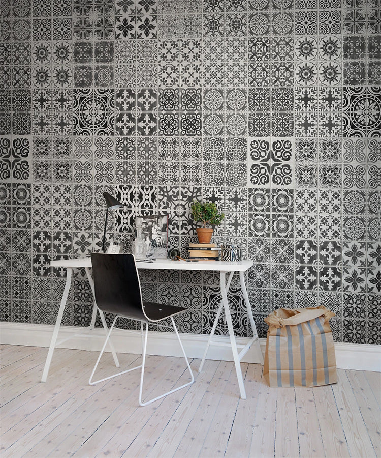 Marrakech Tiles, Pattern Wallpaper in dark grey featured on a wall of a study room with white table and black chair 