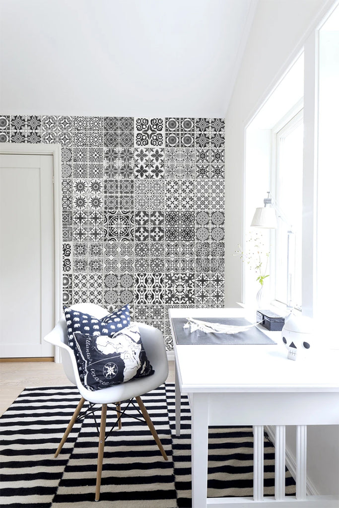 Marrakech Tiles, Pattern Wallpaper in dark grey featured on a wall of a study room with white table and white chair 