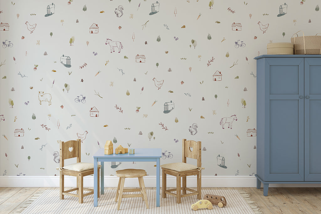 A children’s room adorned with a Mini Barnyard, Pattern Wallpaper, featuring delightful illustrations of farm animals, barns, and tractors. The room is furnished with a blue cabinet, wooden chairs, and a table set with toys.