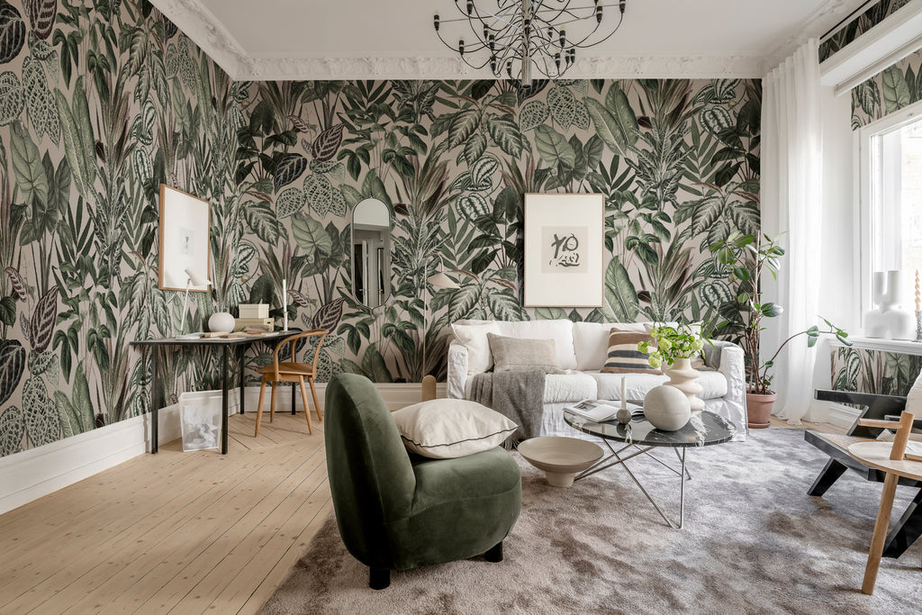 Night-time Jungle, Tropical Mural Wallpaper in blush pink featured on a wall of living area with a sofa set, wooden chair and coffee table