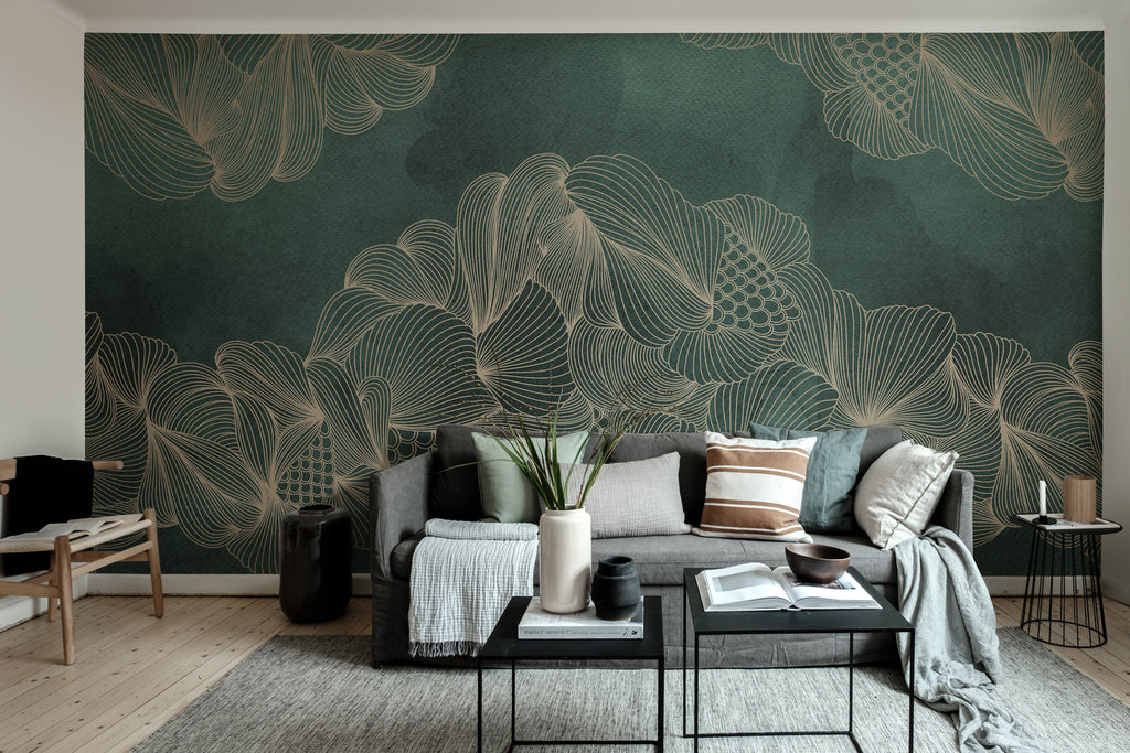 Opulent Beauty, Wallpaper in green featured on wall of a living area with grey fabric sofa with multiple pillows and sheets and two black tables