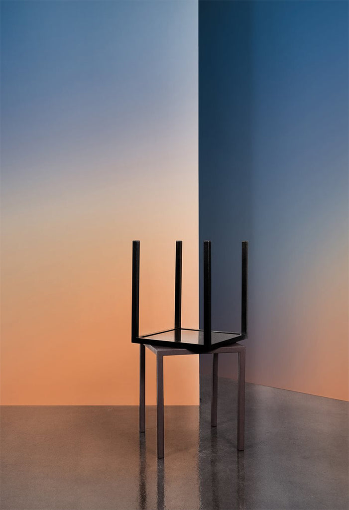 Orange Blue Gradient, Wallpaper featured in a wall of a room with 2 chairs on top of each other upside down with a smooth concrete floor