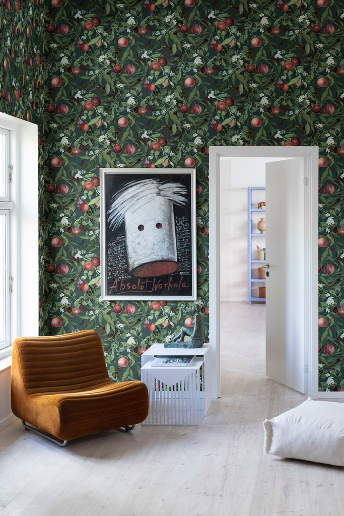 Closed up Peach Valley, Floral Pattern Wallpaper in crimson, as seen in cozy living area. 