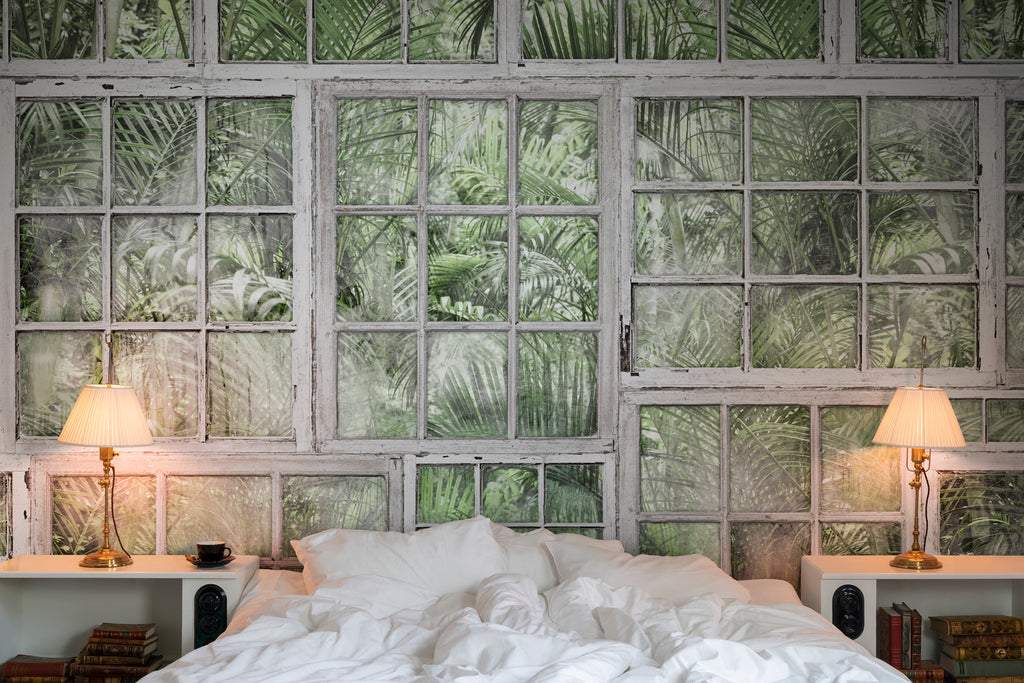 Perspective Garden, Mural Wallpaper adorning the walls of a bedroom with soft fabrics and cushions 