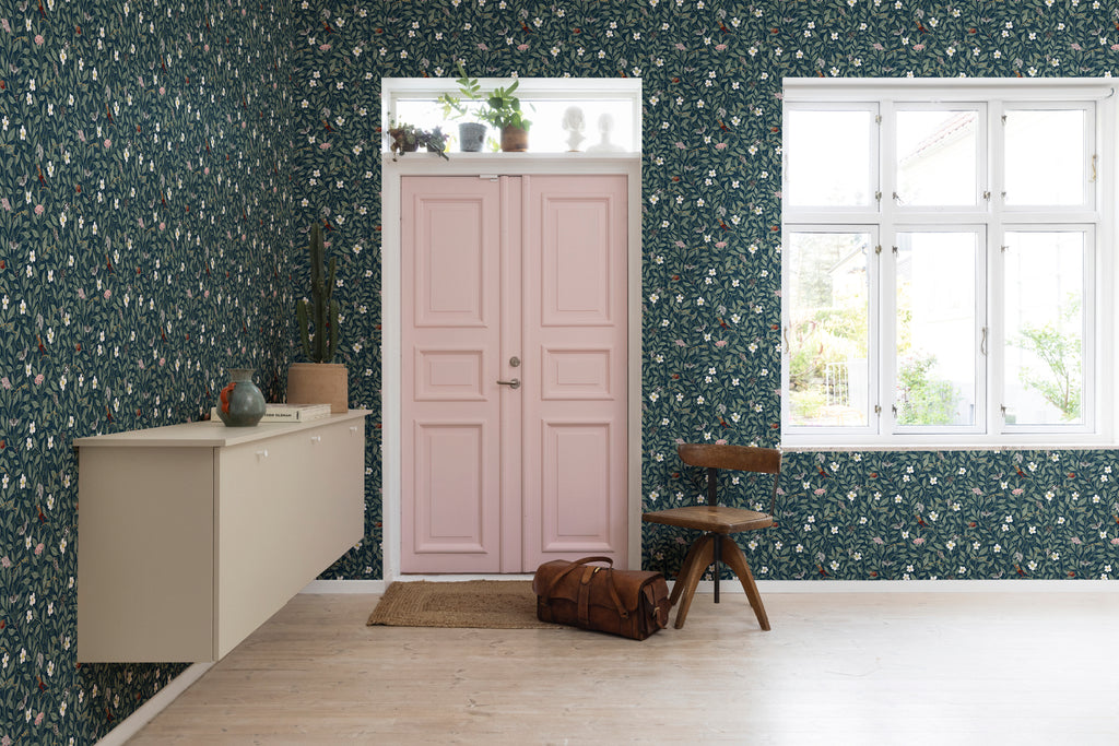 Pixie, Floral Pattern Wallpaper in Dark Blue as seen in a cozy and almost empty room