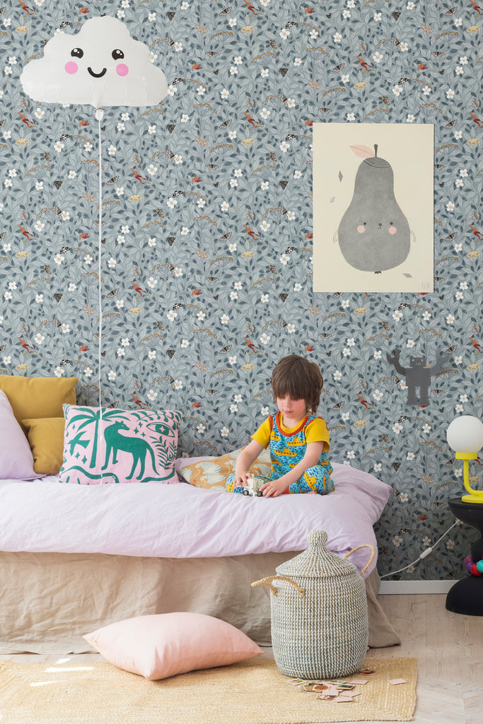 Closed up, Pixie, Floral Pattern Wallpaper, in light blue, featured on a wall of child's bedroom with cute light lamp