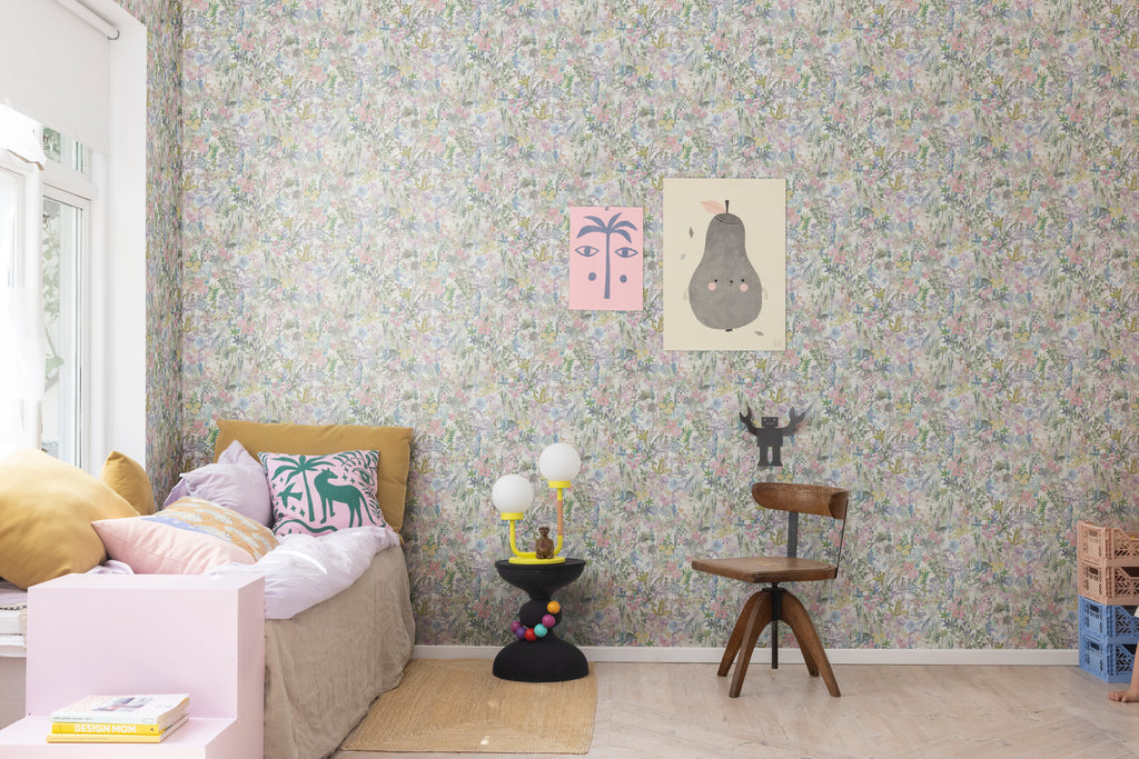 Poppy Meadow, Floral Pattern Wallpaper in Pink as seen in a cozy living area with framed art and colourful furniture