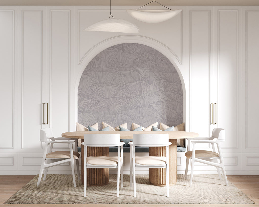 A modern, spacious dining room featuring an arched alcove, a large wooden table with white chairs, a sleek floor lamp, and a unique light fixture. The room’s elegance is enhanced by the Saltwater Ripples, Pattern Wallpaper in Purple.