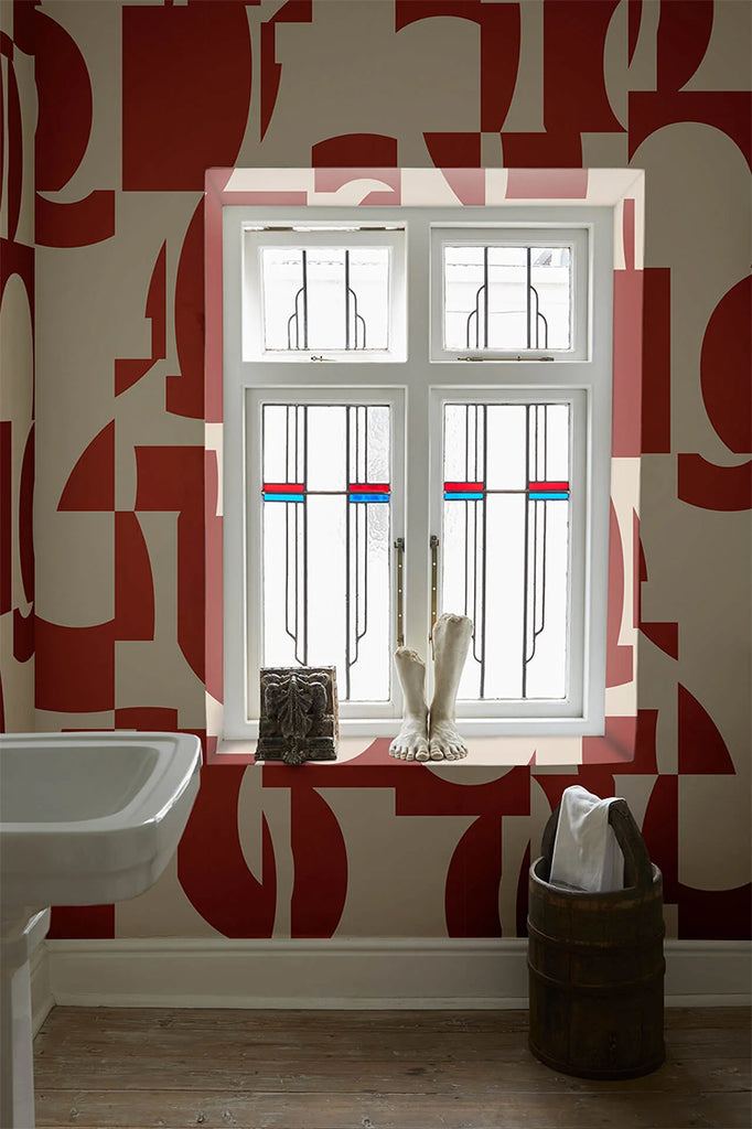 Slow Assembly, Geometric Pattern Wallpaper in Red featured on the wall with a window in a toilet