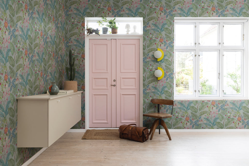Strawberry Lane, Pattern Wallpaper in Green as seen in an empty room with pink door