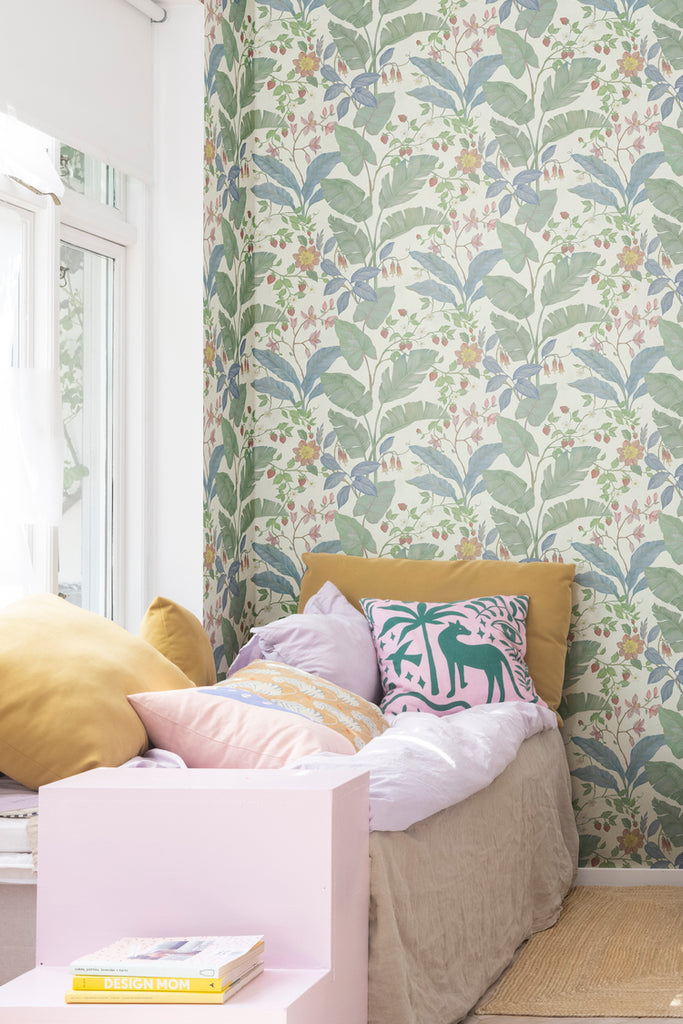 Closed up, Strawberry Lane, Pattern Wallpaper in Sand as seen in a living area with pink and yellow cushion