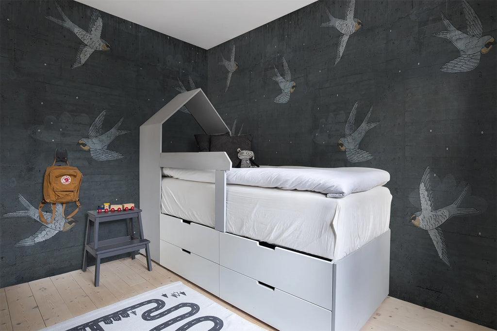 Swallow Flight, Pattern Wallpaper in dark blue featured on a wall of kid's bedroom with a high level bedroom in white sheets