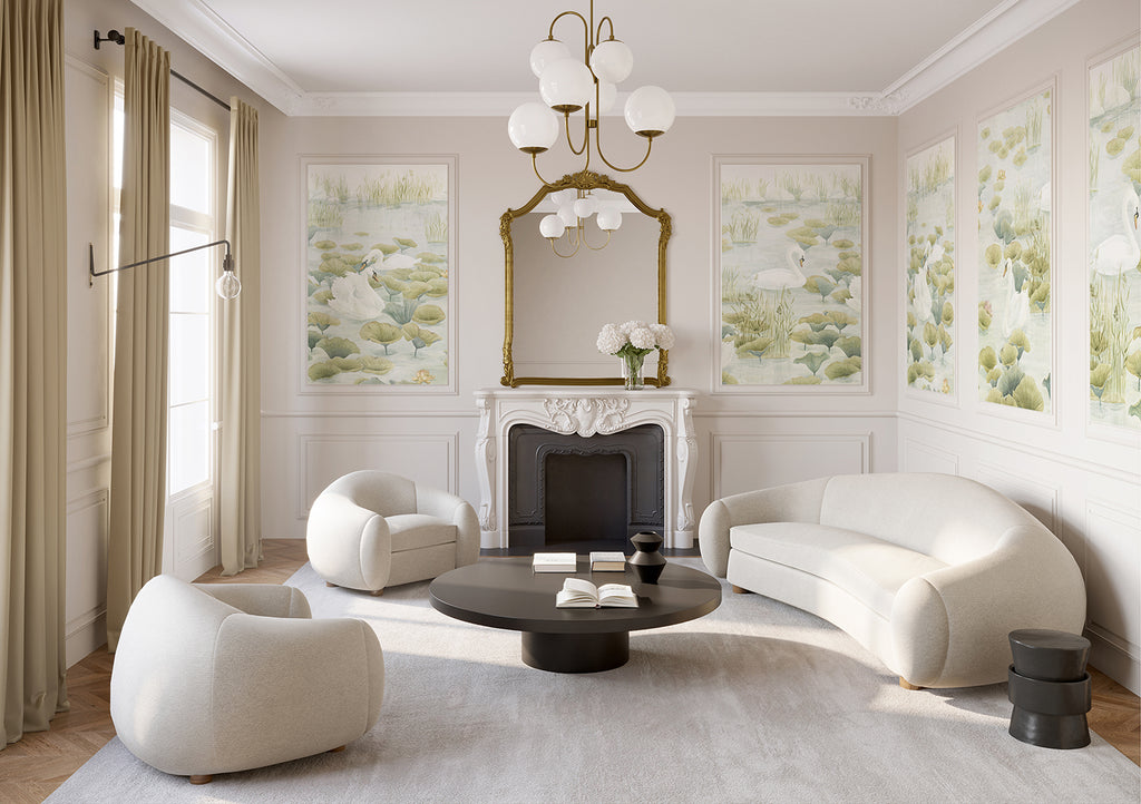 An elegant living room adorned with Swans and Lilies, Nature Mural Wallpaper. A luxurious white sofa, two matching armchairs, and a dark round coffee table create a serene nature-inspired ambiance. An ornate fireplace and a tall window add to the room’s classic design.