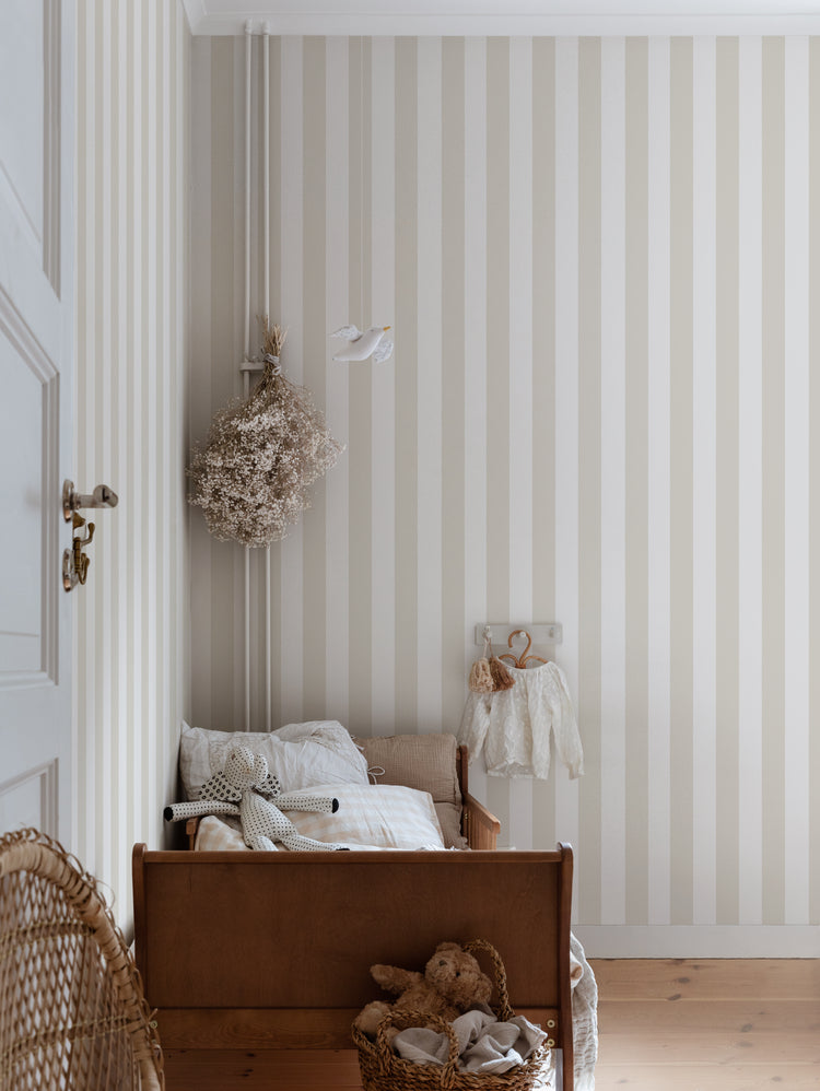 Teira, Striped Wallpaper in Nude featured in a bedroom.