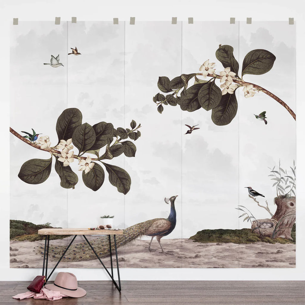 A serene scene of Vintage Bird, Mural Wallpaper depicting a peacock, birds in flight, and blossoming branches on a light backdrop, bringing nature’s tranquility indoors.