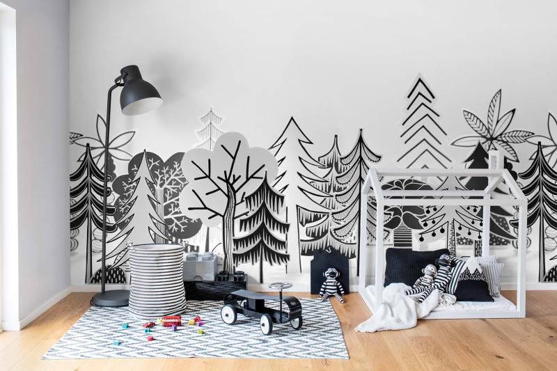The Grey Valley Wallpaper sets a cozy tone in another child's playroom, surrounded by an array of toys that invite creativity and playfulness.