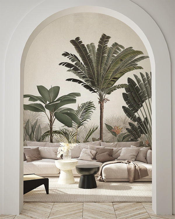 Palm Paradise, Tropical Mural Wallpaper in honey colourway featured in a natural-lit living room, as seen in an arched door. 