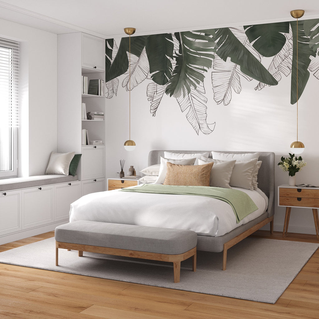 Banana Garden wallpaper in a bedroom, with light coloured wood and neutral coloured furnishings