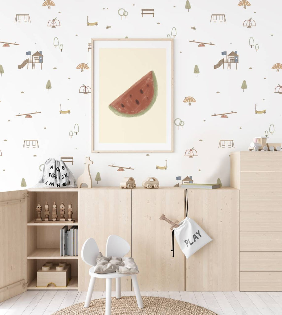 Mini Fruitful Play, Pattern Wallpaper in white seen in a kid's room with wood flooring and wooden cabinet  with wooden toys.