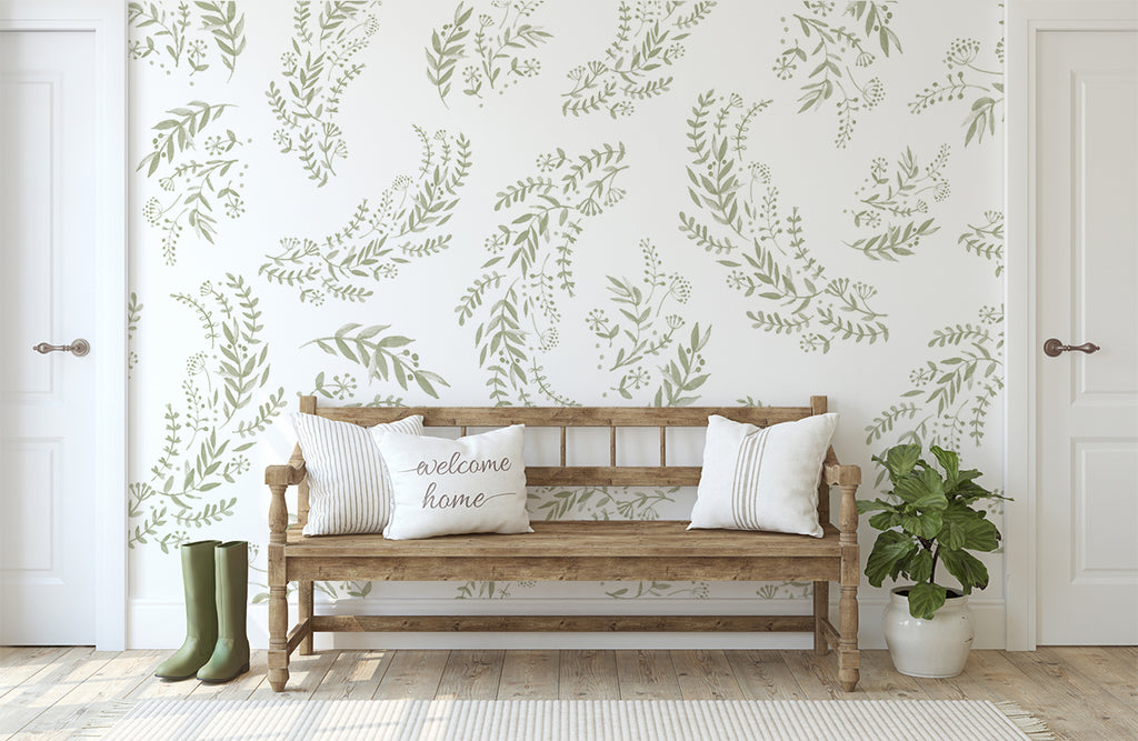 Flower Fields, Floral Pattern Wallpaper featured in living area with wooden chairs and soft white pillows. 